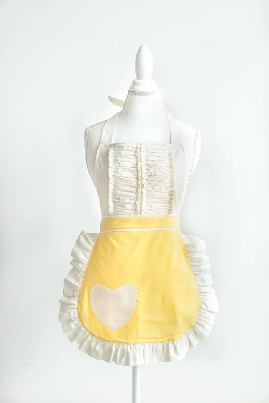 A Vintage Darling apron in yellow